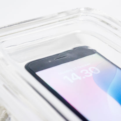 Closeup of Varjelus phone charging glass box surface ripple